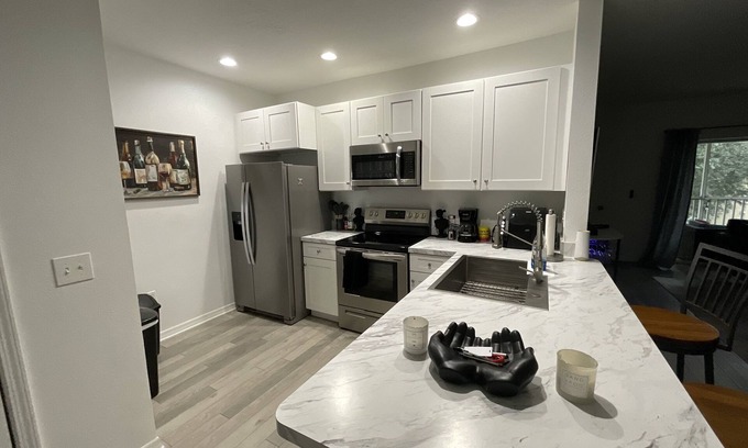 Riverview Apartment | Artful Haven: A Stylish Escape