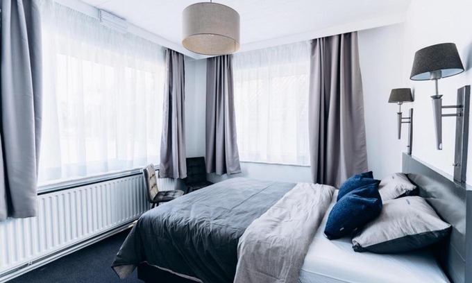 Strombeek-Bever Hotel | Atomihotel: Contemporary Comfort Steps from the Atomium!
