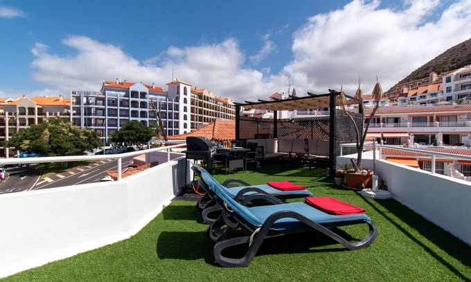 Los Cristianos House | Attractive 2 Bedroom Apartment. Large Roof Terrace. Amazing Sea Views.