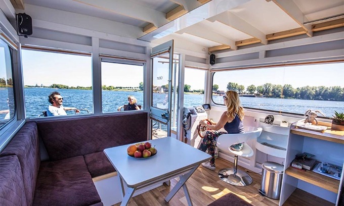Ophoven Boat Rental | Attractive houseboat in Kinrooi with terrace