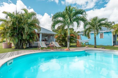 Sainte-Rose House | Au son des Grenouilles