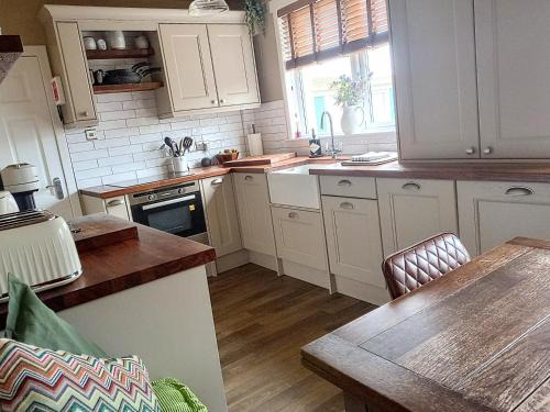 St. Andrews House | Auld Tom's Rest