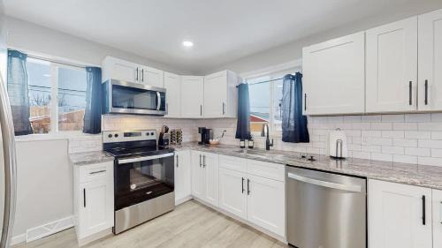 Twin Lakes House | Awesome Two Bedroom Family Upper Unit in Denver
