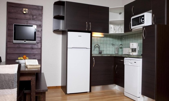 Lanslevillard Apartment | Balcony, parking, tv, ski locker, 35m², Val Cenis