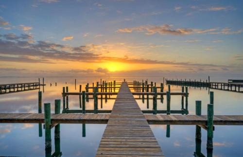 Flour Bluff House | Balcony w Bay View Shared Pool Boat Dock Fat Flounder by AvantStay