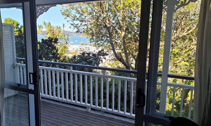 Paihia Apartment | Bay and village view, 2 person spa bath