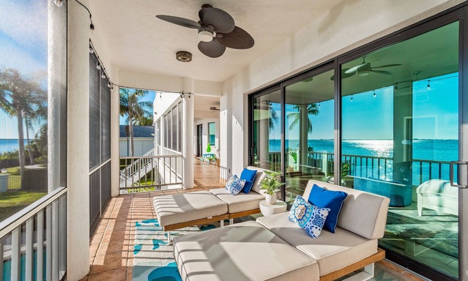 Bayshore Gardens House | Bayfront estate with heated pool, private beach, dock & incredible sunsets