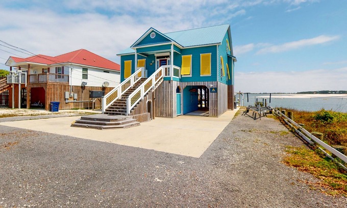 Royal Lagoons House | Bayfront home with boat slip, scenic balcony, W/D, & AC - close to beaches