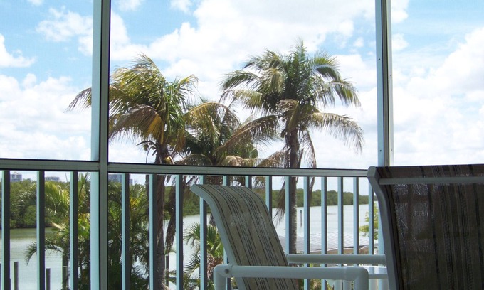 Bonita Springs Condo | Bayfront on Bonita Beach- modern, beach access, pool, community docks !