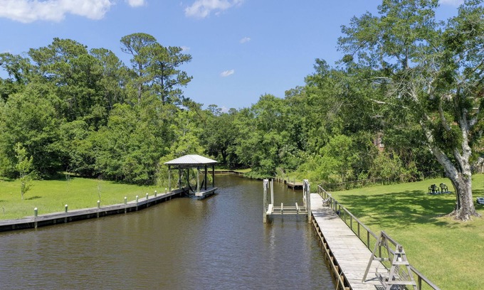 Gulf Hills House | Bays, Bayous and Beyond! Hot Tub! Waterfront!