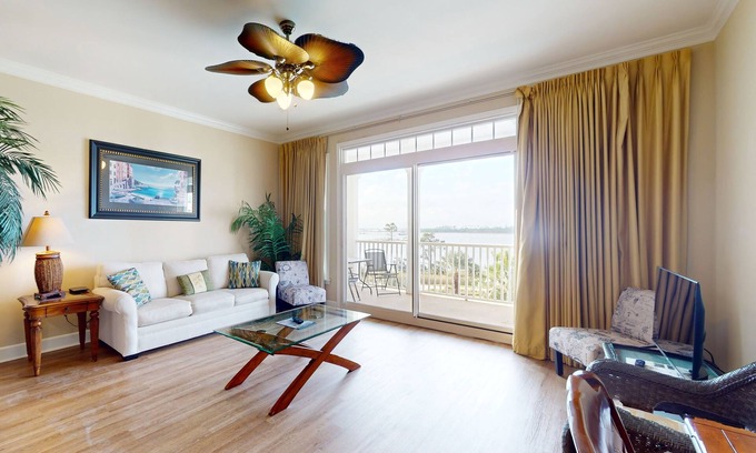 Upper Grand Lagoon Condo | Bayview condo with pool, hot tub, and private balcony