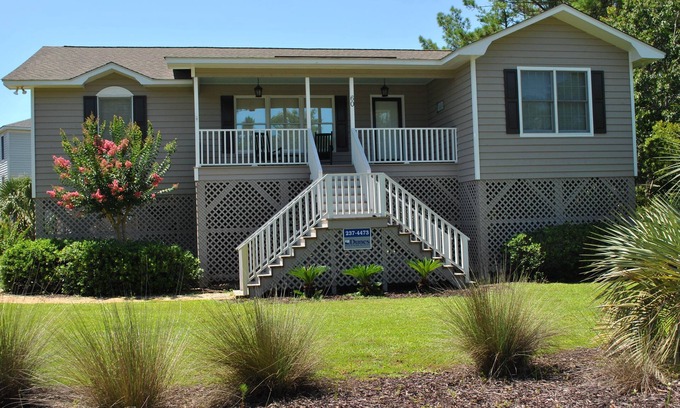 North Litchfield Beach House | Beach house featuring screen porch with rockers & swing located at North Litchfield Beach.