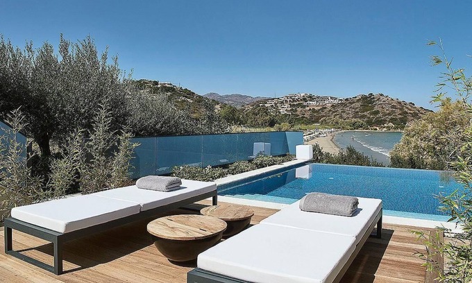 Almyros Villa | Beachfront 5 bedroom villa with a heated pool