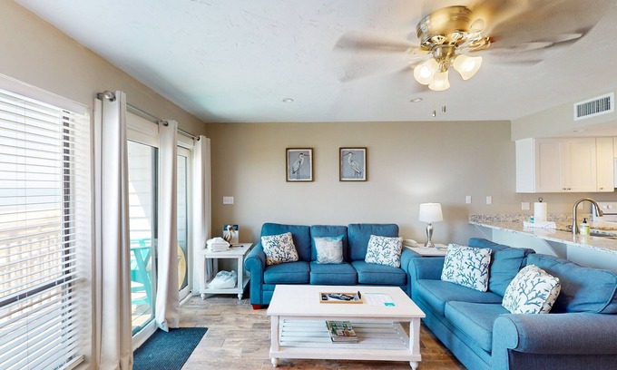 East End House | Beachfront East End townhouse with beach views, deck, on-site pool & grills