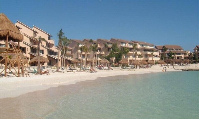 Puerto Aventuras Condo | Beachfront Location with 2 Pools; Private Terrace
