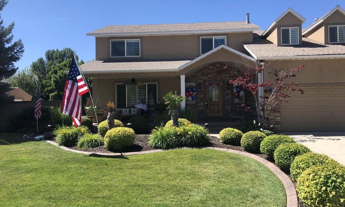 River Bottoms House | Beachy Home in Provo. Large deck with builtin hot tub, Fire pit, Palapa