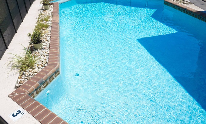 Ludlam House | Beautiful 3 BR home w/a refreshing pool, w/lots of yard space
