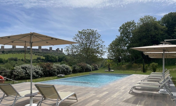 Monteriggioni Apartment | Beautiful apartment for 2 guests with WIFI, A/C, pool, TV, pets allowed and parking, close to Si.