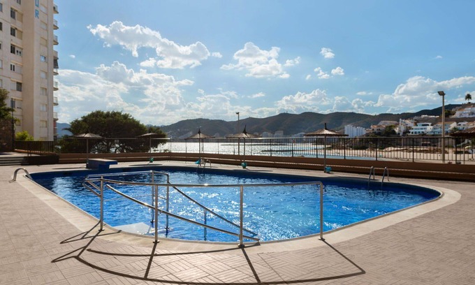 Faro de Cullera Apartment | Beautiful apartment for 4 people with pool, WIFI, TV and balcony