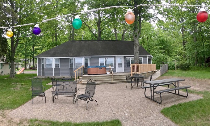 Traverse City Cabin | Beautiful Cabin on the Lake with Hot Tub & Sandy Beach!