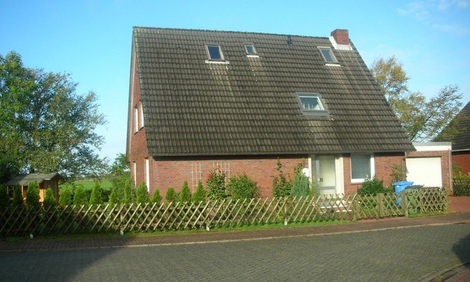 Dornum Apartment | Beautiful fine apartment with garden, meadow, view of water and land