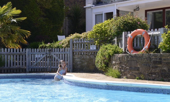 Eastbourne House | Beautiful family house with pool and views over golf course and South Downs
