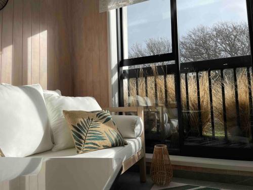 Addington Apartment | Beautiful Hagley Park view apartment in CBD