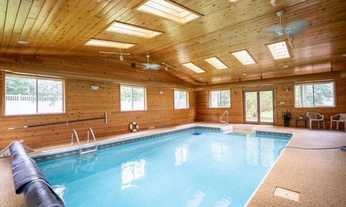 Rib Mountain House | Beautiful home on the Lake. Indoor Pool. Private Pier and a mile from Ski Hill
