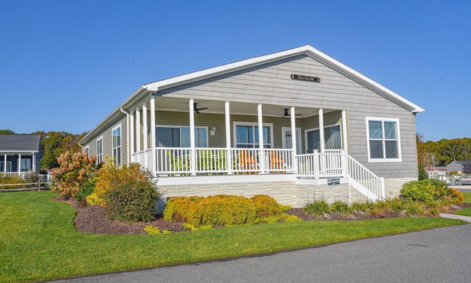 Long Neck House | Beautiful home-waterfront, beach, pools, family fun & pets!