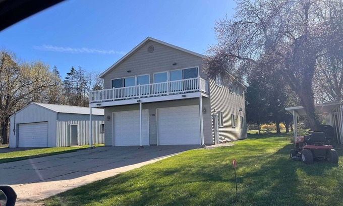 Allegan House | Beautiful Lake Views with Balcony - Elevated Ranch in Allegan