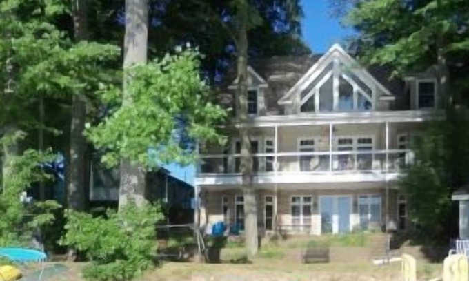Marcellus House | Beautiful lakefront home perfect for family reunions: great swimming, game room.