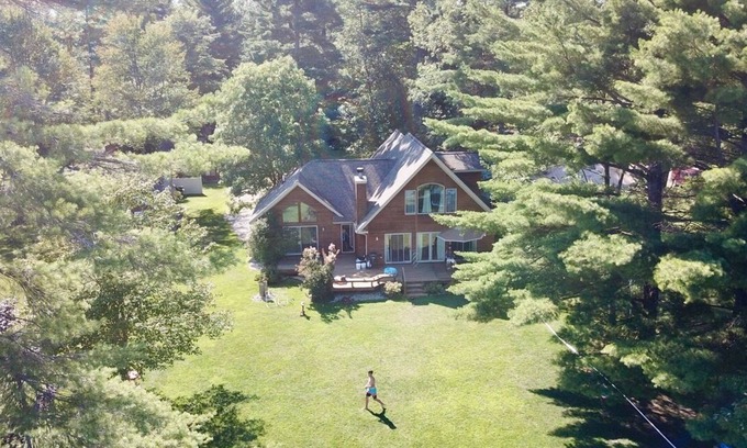 Gaylord House | Beautiful lakeside home with private beach, access to golf, skiing, shopping.
