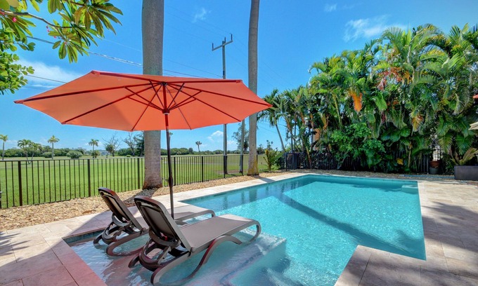 Parrot Cove House | Beautiful Pool home on Golf Course, with Intracoastal views, 1 mile to the Beach