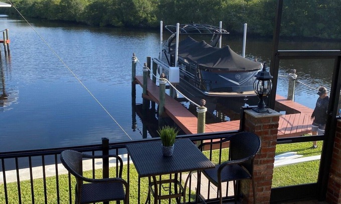 Fort Myers House | Beautiful ranch home on quiet canal with ocean access and spa.