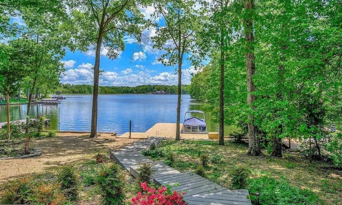 Lake of the Woods House | Beautiful, spacious, lakefront home large lot, firepit, hot tub, and more