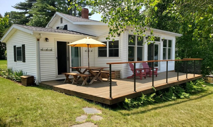 Raymond House | Beautifully landscaped home on Panther Pond just 20 feet from the shore!