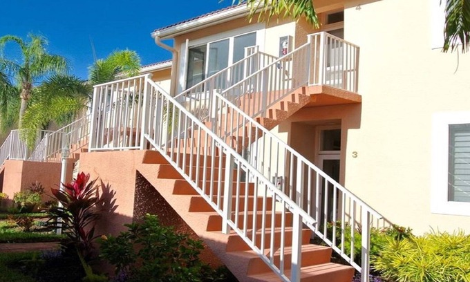 Naples Condo | Beautifully Remodeled Second Floor Falling Waters Condo 2 minutes to the Pool
