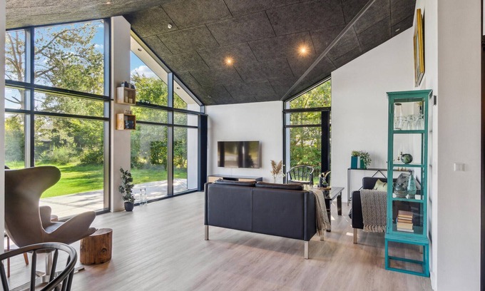 Hojslev House | Beautifully situated house on a natural plot with magnificent fjord views.