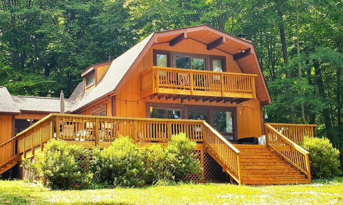 Livingston House | Beautifully situated lakefront house with private dock/boat house/fire pit/views