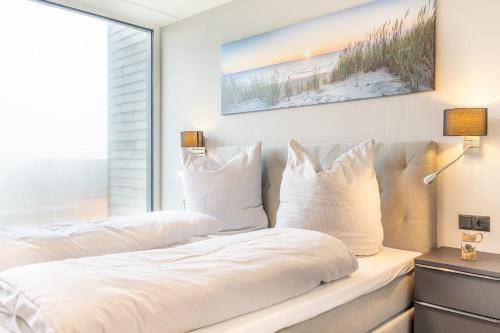 Marienleuchte Apartment | BeltBlick 3 - Moderne Ferienwohnung direkt an der Ostsee mit Meerblick und Sauna!