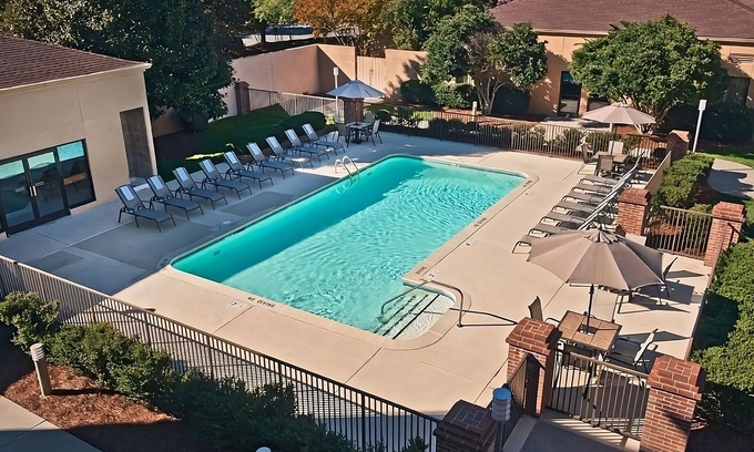 Morrisville Resort | Best Value, Quality Stay! Pets Allowed, Swimming Pool, Free Airport Shuttle!