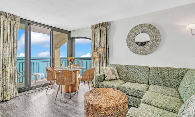 Windy Hill Condo | Best view at Beach Cove- Tropical oceanfront corner condo with double balcony!