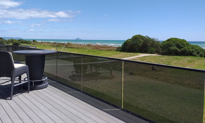 Waiotahi House | Big Black Beachfront Bach in family friendly community.