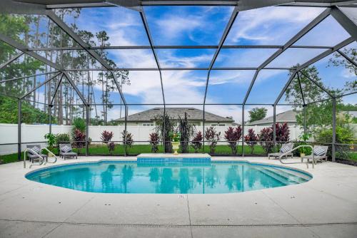 Palm Coast House | Bike, Golf and Swim Palm Coast Home with Lanai!