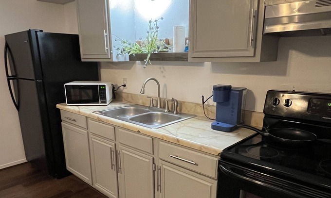 Eagle Pass Apartment | Black Chikadee