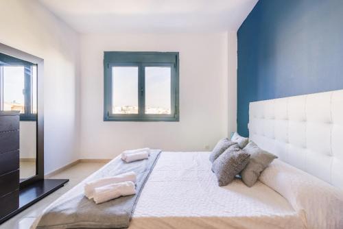 Vecindario Apartment | Blue & White House