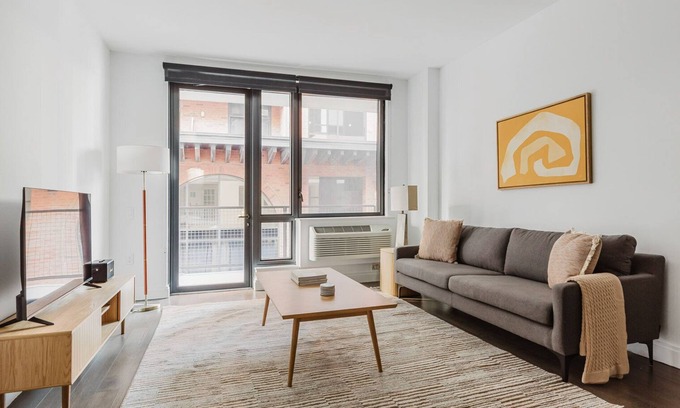 Powerhouse Arts District Apartment | Blueground | Jersey City, EV charging, nr park