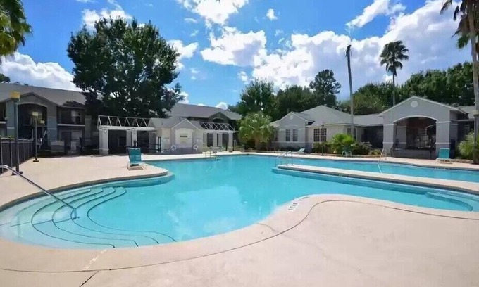 Gainesville Condo | Botanical Retreat: King Comfort & Poolside Peace