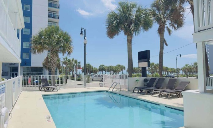 Downtown Myrtle Beach Apartment | Boutique on the beach, Studio #102 + Pool