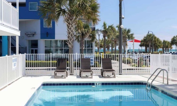 Downtown Myrtle Beach Apartment | Boutique on the beach, Studio #118 + Pool